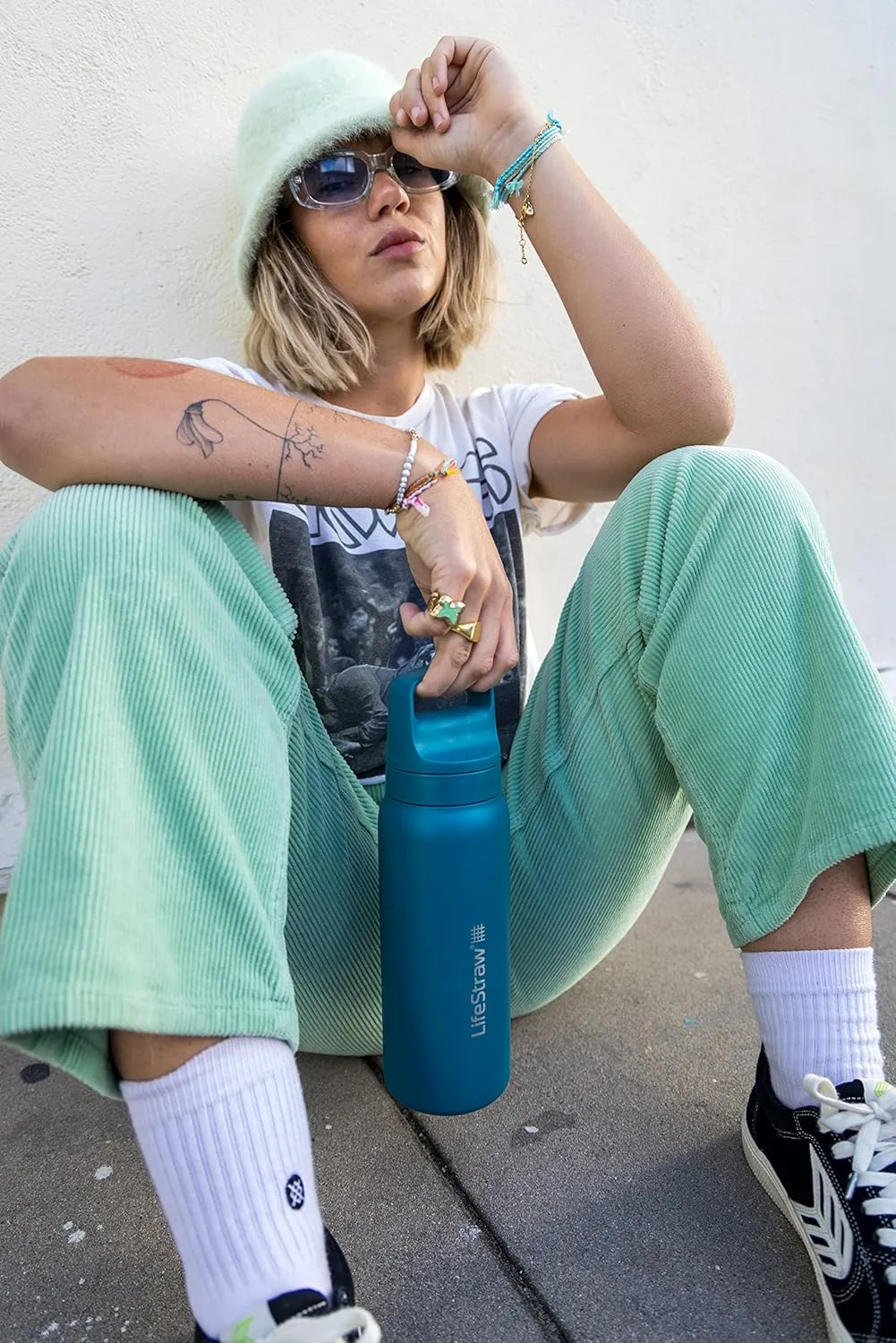 LifeStraw Go Series  Insulated Stainless Steel Water Filter Bottle for Travel and Everyday Use Removes Bacteria, Parasites and Microplastics, Improves Taste, 24oz Laguna Teal